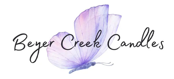black text beyer creek candles with purple butterfly logo